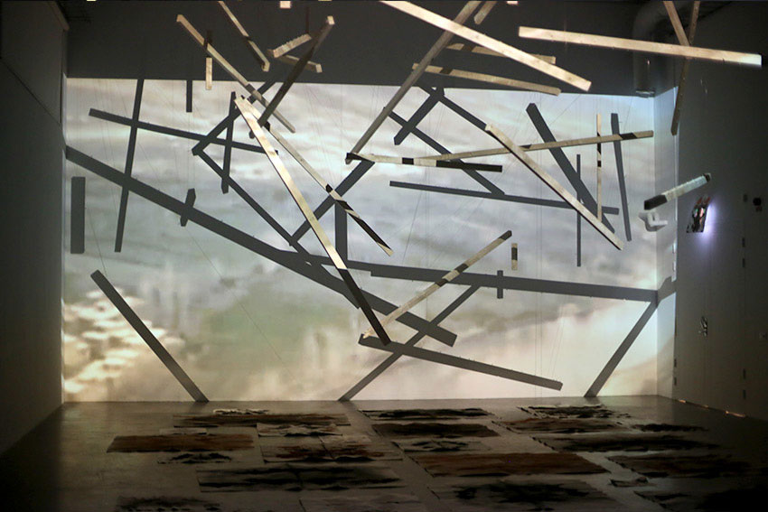 installation with projections of videos from the Afghan-Soviet war, 19791989, Rorschach test like pigment drawings and sound at Swedish art gallery 