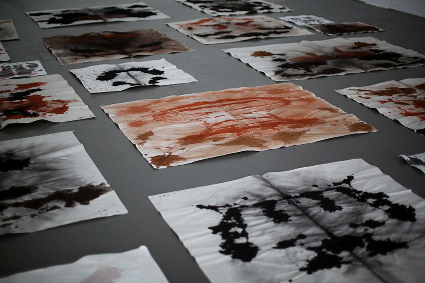installation with projections of videos from the Afghan-Soviet war, 19791989, Rorschach test like pigment drawings and sound at Swedish art gallery 