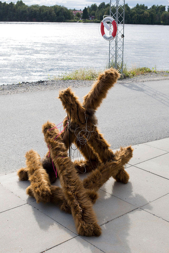 Switch, faux fur object installation in public space by the river, Sweden