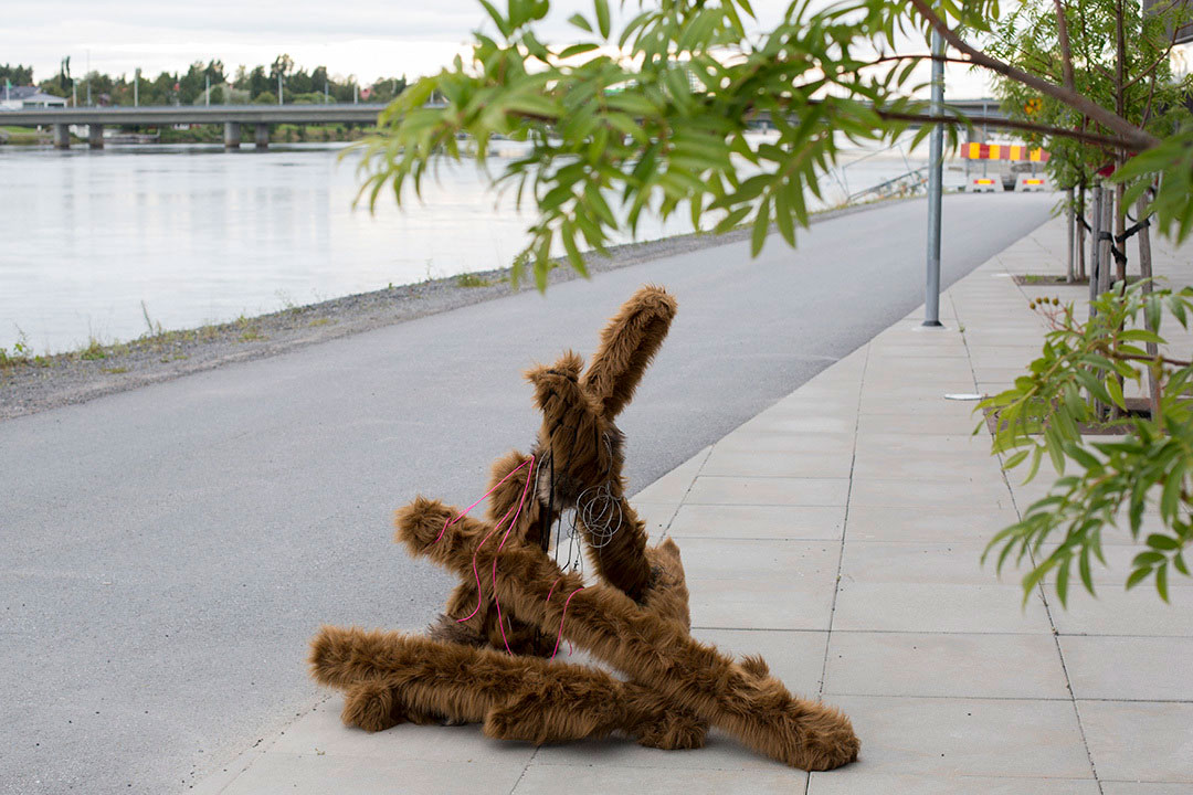 Switch, faux fur object installation in public space by the river, Sweden