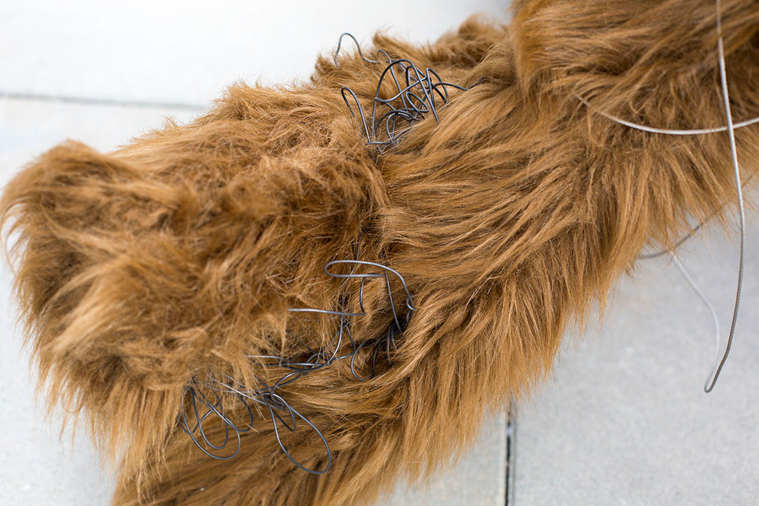 Switch, faux fur object installation in public space by the river, Sweden