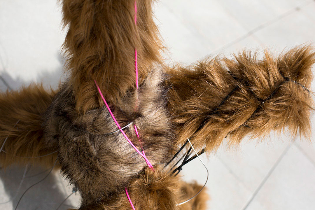 Switch, faux fur object installation in public space by the river, Sweden
