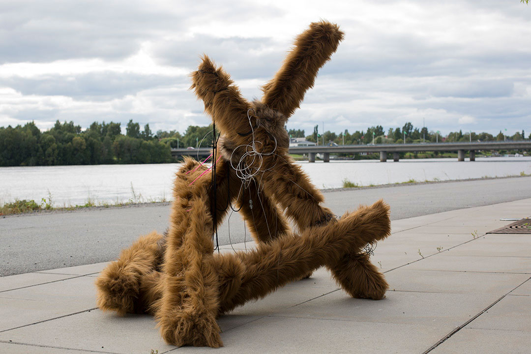 Switch, faux fur object installation in public space by the river, Sweden